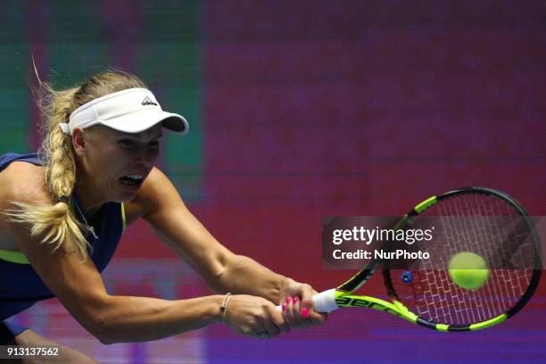 Caroline Wozniacki of Denmark returns the ball to Anastasia Potapova of Russia during the St. Petersburg Ladies Trophy ATP tennis tournament match in...