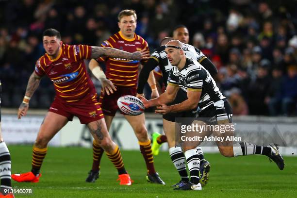 Hull FC's Danny Houghton passes the ball during the BetFred Super League match between Hull FC and Huddersfield Giants at KCOM Stadium on Thursday,...