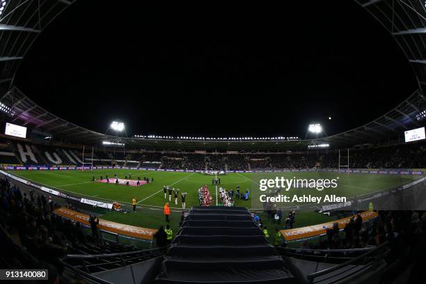 Players take the field during the BetFred Super League match between Hull FC and Huddersfield Giants at KCOM Stadium on Thursday, February 1, 2018 in...