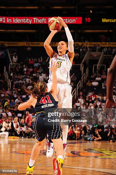 Diana Taurasi of the Phoenix Mercury puts a shot up over Tully Bevilaqua of the Indiana Fever in Game Two of the WNBA Finals on October 1, 2009 at...