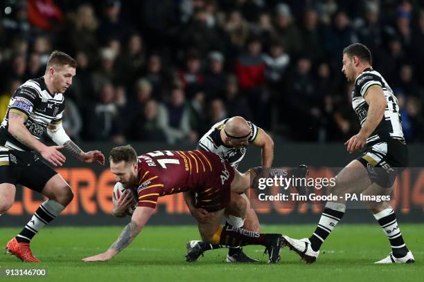Huddersfield Giants' Jordan Rankin is tackled by Hull FC's Danny Houghton during the Betfred Super League match at the KCOM Stadium, Hull.