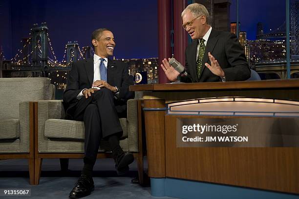 This September 21, 2009 file photo shows US President Barack Obama with David Letterman during a taping of "The Late Show with David Letterman" in...