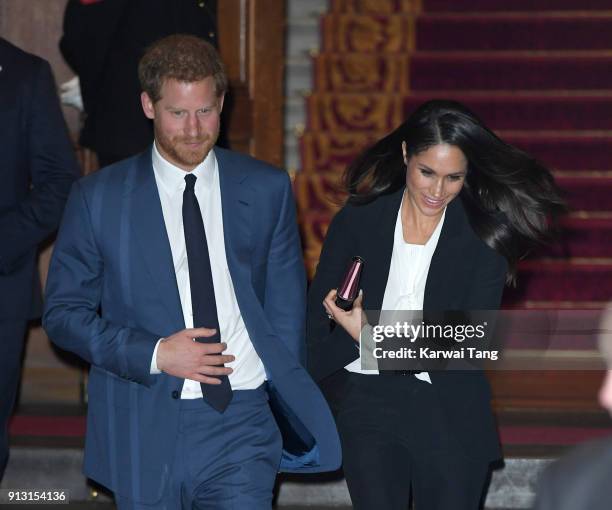 Prince Harry and fiancee Meghan Markle depart after attending the 'Endeavour Fund Awards' Ceremony at Goldsmiths' Hall on February 1, 2018 in London,...