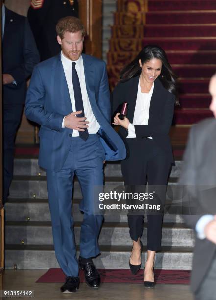 Prince Harry and fiancee Meghan Markle depart after attending the 'Endeavour Fund Awards' Ceremony at Goldsmiths' Hall on February 1, 2018 in London,...