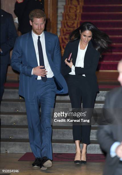 Prince Harry and fiancee Meghan Markle depart after attending the 'Endeavour Fund Awards' Ceremony at Goldsmiths' Hall on February 1, 2018 in London,...