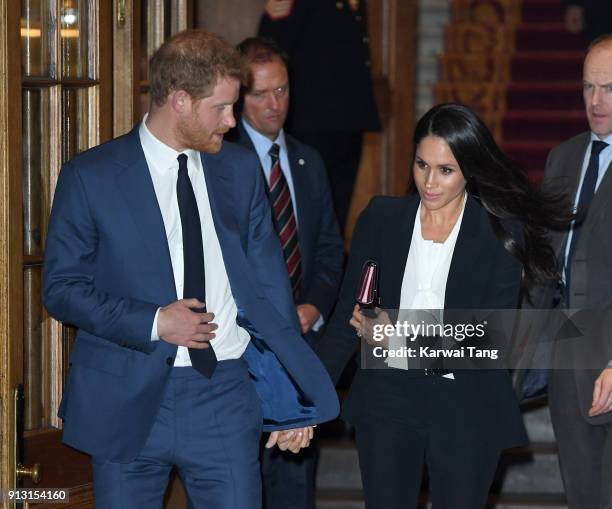 Prince Harry and fiancee Meghan Markle depart after attending the 'Endeavour Fund Awards' Ceremony at Goldsmiths' Hall on February 1, 2018 in London,...