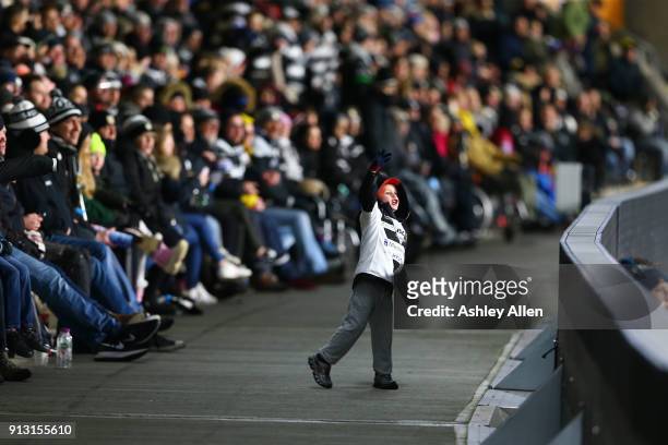 Young Hull FC fan cheers on Marc Sneyd during the BetFred Super League match between Hull FC and Huddersfield Giants at KCOM Stadium on February 1,...