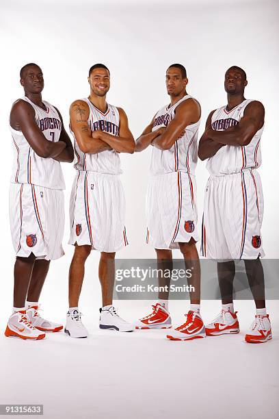 DeSagana Diop, Tyson Chandler, Alexis Ajinca and Nazr Mohammed of the Charlotte Bobcats pose for a group portrait during 2009 NBA Media Day at Time...
