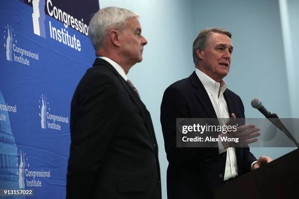 Sen. David Perdue and Rep. Steve Womack hold a news briefing during the 2018 House & Senate Republican Member Conference February 1, 2018 at the...