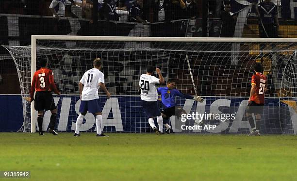 Argentina's Velez Sarsfield footballer Leandro Caruso scores the team's second goal against Chile's Union Española during a Copa Sudamericana...