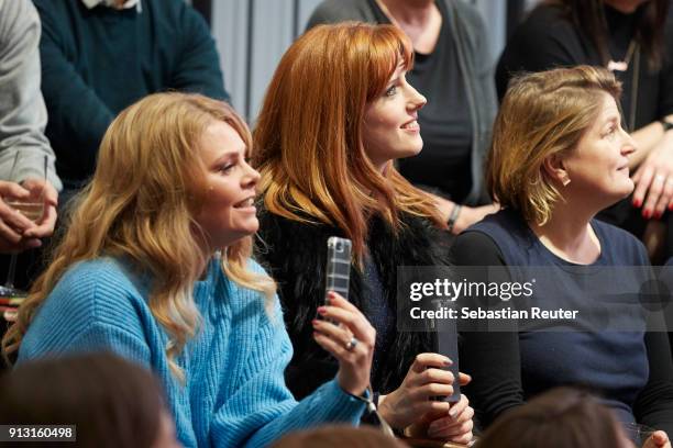 Ann Sophie Briest and Wilma Elles are seen in the audience during the discussion panel Clich'e Bashing: Kindererziehung at DRIVE Volkswagen Group...