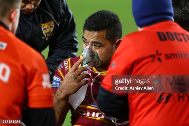 Jordan Turner of Huddersfield Giants takes in some oxygen after taking a hard hit during the BetFred Super League match between Hull FC and...