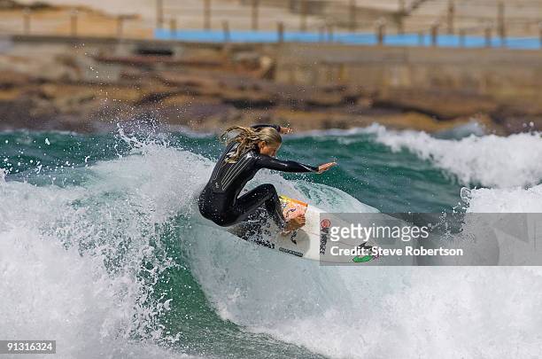 Paige Hareb of New Zealand surfs during her morning warm up at the 2009 Women's Beachley Classic as part of the ASP World Tour atDee Why beach on...