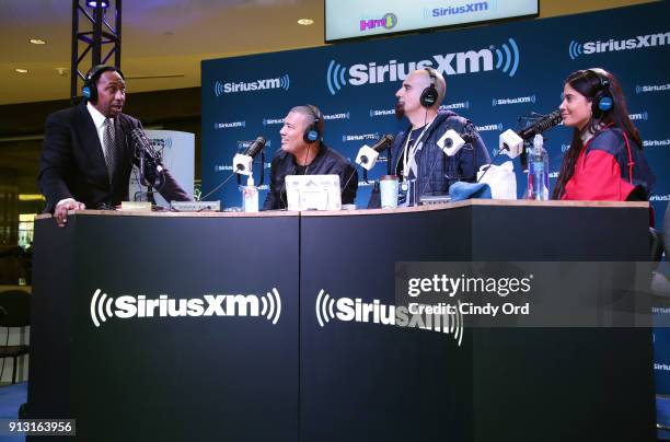 Personalities Stephen A. Smith, Michael Yo, Tony Fly and musical artist Symon attend SiriusXM at Super Bowl LII Radio Row at the Mall of America on...