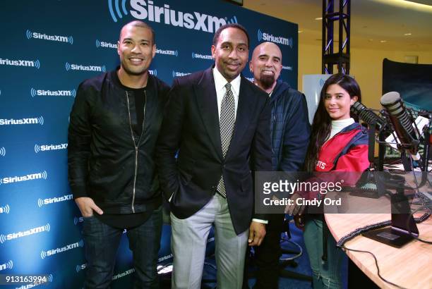 Personalities Michael Yo, Stephen A. Smith, Tony Fly and musical artist Symon attend SiriusXM at Super Bowl LII Radio Row at the Mall of America on...