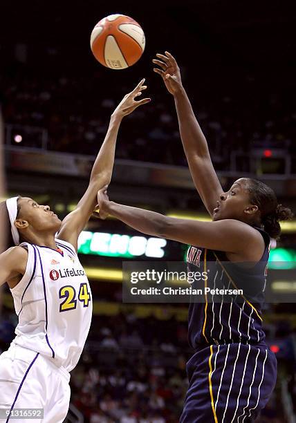 Ebony Hoffman of the Indiana Fever puts up a shot over DeWanna Bonner of the Phoenix Mercury in Game Two of the 2009 WNBA Finals at US Airways Center...