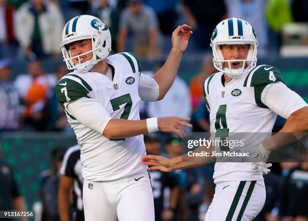 Chandler Catanzaro and Lachlan Edwards of the New York Jets in action against the Jacksonville Jaguars on October 1, 2017 at MetLife Stadium in East...