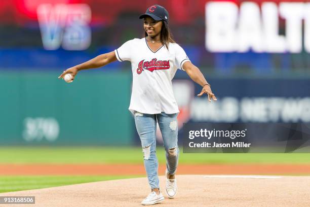 Olympic Gymnast Simone Biles throws out the first pitch prior to the game between the Cleveland Indians and the Baltimore Orioles at Progressive...