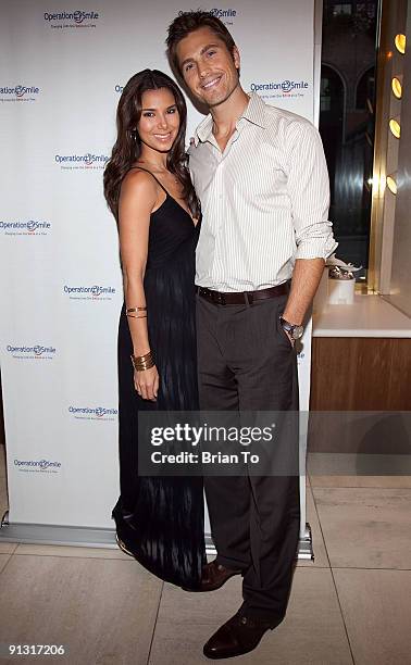 Roselyn Sanchez and Eric Winter attend 8th Annual Operation Smile Pre-Gala Kick-Off Reception at Lladro Boutique on October 1, 2009 in Beverly Hills,...