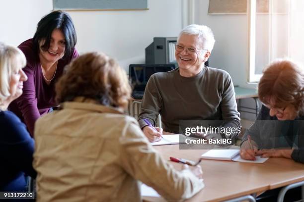 adult language learning - adult education stock pictures, royalty-free photos & images