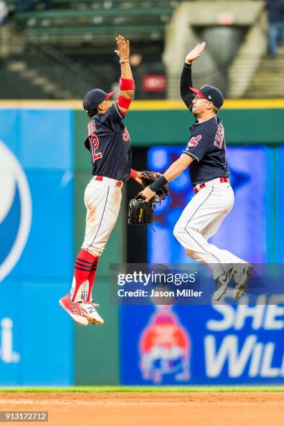 Francisco Lindor of the Cleveland Indians and Lonnie Chisenhall celebrate after the Cleveland Indians win the game against the Baltimore Orioles at...