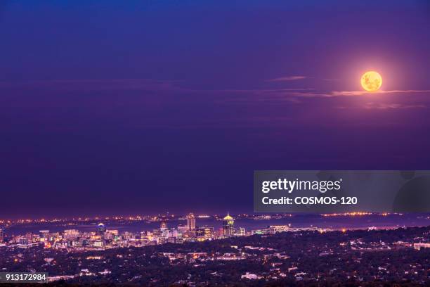 sandton city in the evening with the super blue moon - johannesburg building stock pictures, royalty-free photos & images