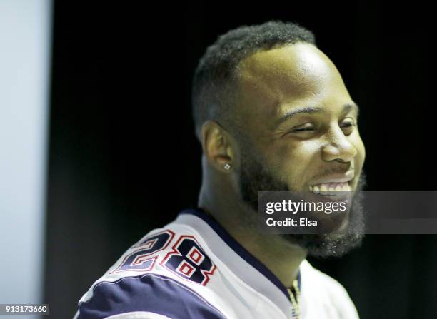 James White of the New England Patriots speaks to the press during the New England Patriots Media Availability for Super Bowl LII at the Mall of...