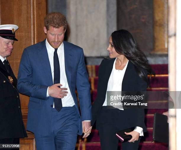 Prince Harry and fiancee Meghan Markle depart after attending the 'Endeavour Fund Awards' Ceremony at Goldsmiths' Hall on February 1, 2018 in London,...