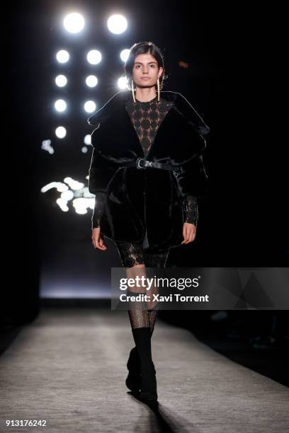 Model walks the runway at the Jinksieminks show during the Barcelona 080 Fashion Week on February 1, 2018 in Barcelona, Spain.