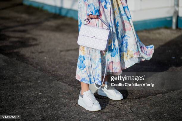 Aylin Koenig wearing Vetements dress, Alexander McQueen sneaker, Acne beanie, Valentino bag during the Copenhagen Fashion Week Autumn/Winter 18 on...