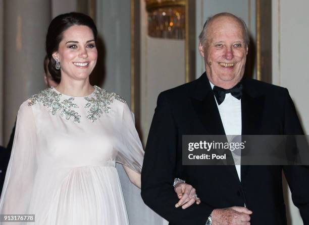 Catherine, Duchess of Cambridge and King Harald V of Norway attend dinner at the Royal Palace on day 3 of their visit to Sweden and Norway on...