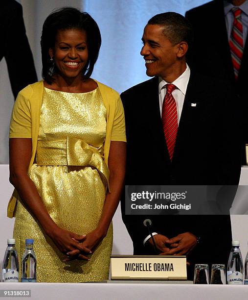 President Barack Obama and his wife Michelle attend the Chicago 2016 presentation on October 2, 2009 at the Bella Centre in Copenhagen, Denmark. The...