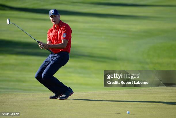 Matt Kuchar reacts to a missed birdie putt on the 14th hole during the first round of the Waste Management Phoenix Open at TPC Scottsdale on February...