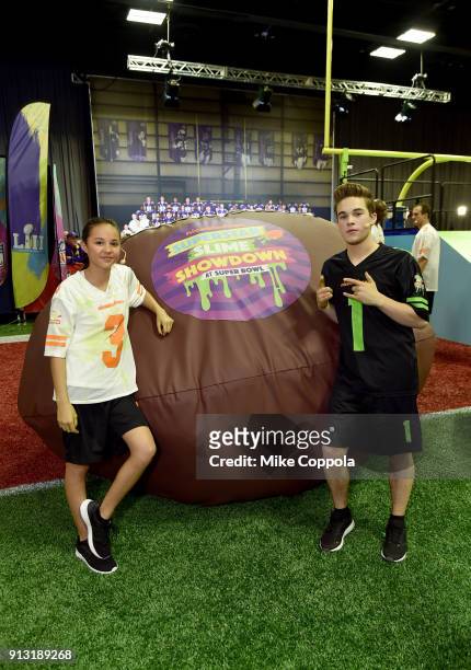 Actors Breanna Yde and Ricardo Hurtado attend the Superstar Slime Showdown taping at Nickelodeon at the Super Bowl Experience on February 1, 2018 in...