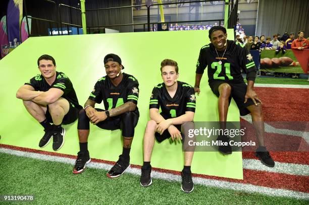 Players Luke Kuechly and Stefon Diggs, actor Ricardo Hurtado and former NFL player Deion Sanders attend the Superstar Slime Showdown taping at...