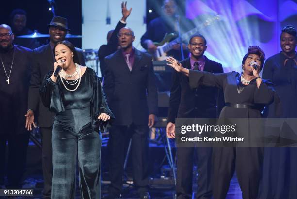 Erica Campbell and Ann Nesby perform onstage with Sounds of Blackness during BET Presents 19th Annual Super Bowl Gospel Celebration at Bethel...