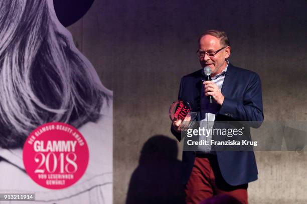 Artdeco' Helmut Baurecht speaks on stage at the Glammy Award 2018 on February 1, 2018 in Munich, Germany.