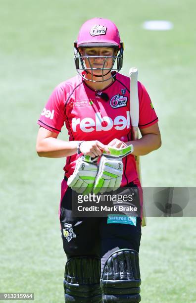 Alyssa Healy of the Sydney Sixers after being caught off a Sophie Devine of the Adelaide Strikers delivery during the Women's Big Bash League match...