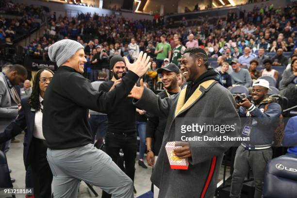 Clay Matthews of the Green Bay Packers and Antonio Brown of the Pittsburgh Steelers seen at the game on February 1, 2018 at Target Center in...
