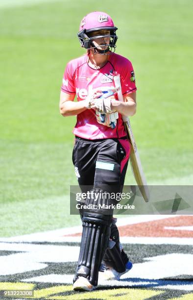 Ellyse Perry captain of the Sydney Sixers out during the Women's Big Bash League match between the Adelaide Strikers and the Sydney Sixers at...