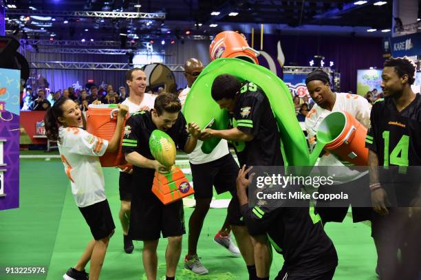 Actors Breanna Yde, Ricardo Hurtado, NFL palyer Luke Kuechly, former NFL player Deion Sanders and NFL player Stefon Diggs attend the Superstar Slime...