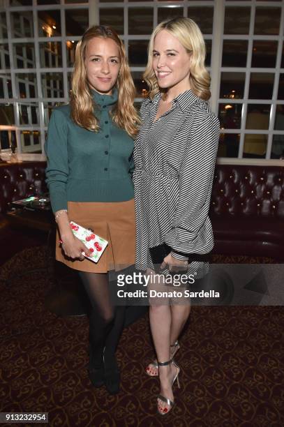 Charlotte Ronson and Allison de Neufville attend Edie Parker's LA Dinner Party at La Dolce Vita on February 1, 2018 in Beverly Hills, California.