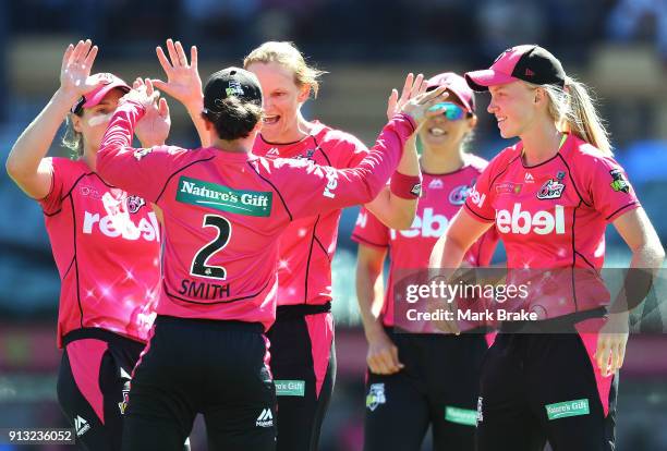 Sarah Aley of the Sydney Sixers celebrates after taking the wicket of Suzie Bates of the Adelaide Strikers during the Women's Big Bash League match...