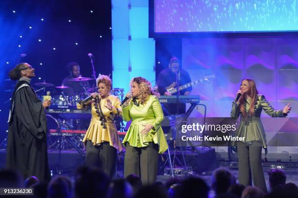 Snoop Dogg performs with Jacky Clark-Chisholm, Dorinda Clark-Cole and Karen Clark Sheard of The Clark Sisters onstage during BET Presents 19th Annual...