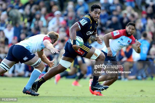 Shannon Frizell of the Highlanders makes a break during the Super Rugby pre-season match between the Highlanders and the Waratahs on February 2, 2018...