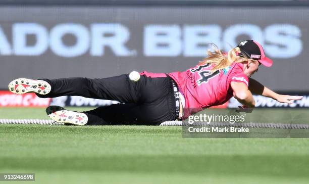 Kim Garth of the Sydney Sixers saves a four during the Women's Big Bash League match between the Adelaide Strikers and the Sydney Sixers at Adelaide...