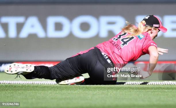 Kim Garth of the Sydney Sixers saves a four during the Women's Big Bash League match between the Adelaide Strikers and the Sydney Sixers at Adelaide...