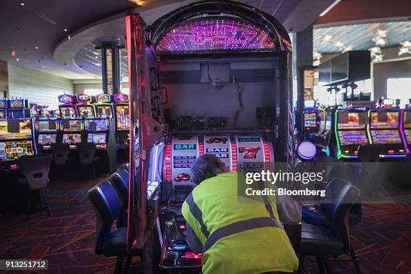 Slot Tech A technician works on a slot machine on the gaming floor of the... News ...