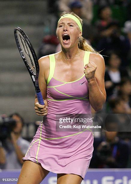 Maria Sharapova of Russia celebrates victory in her match against Agnieszka Radwanska of Poland during day six of the Toray Pan Pacific Open Tennis...