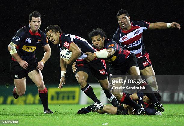 Tim Nanai-Williams of Counties Manukau is tackled by Casey Laulala of Canterbury during the Air New Zealand Cup match between Counties Manukau and...